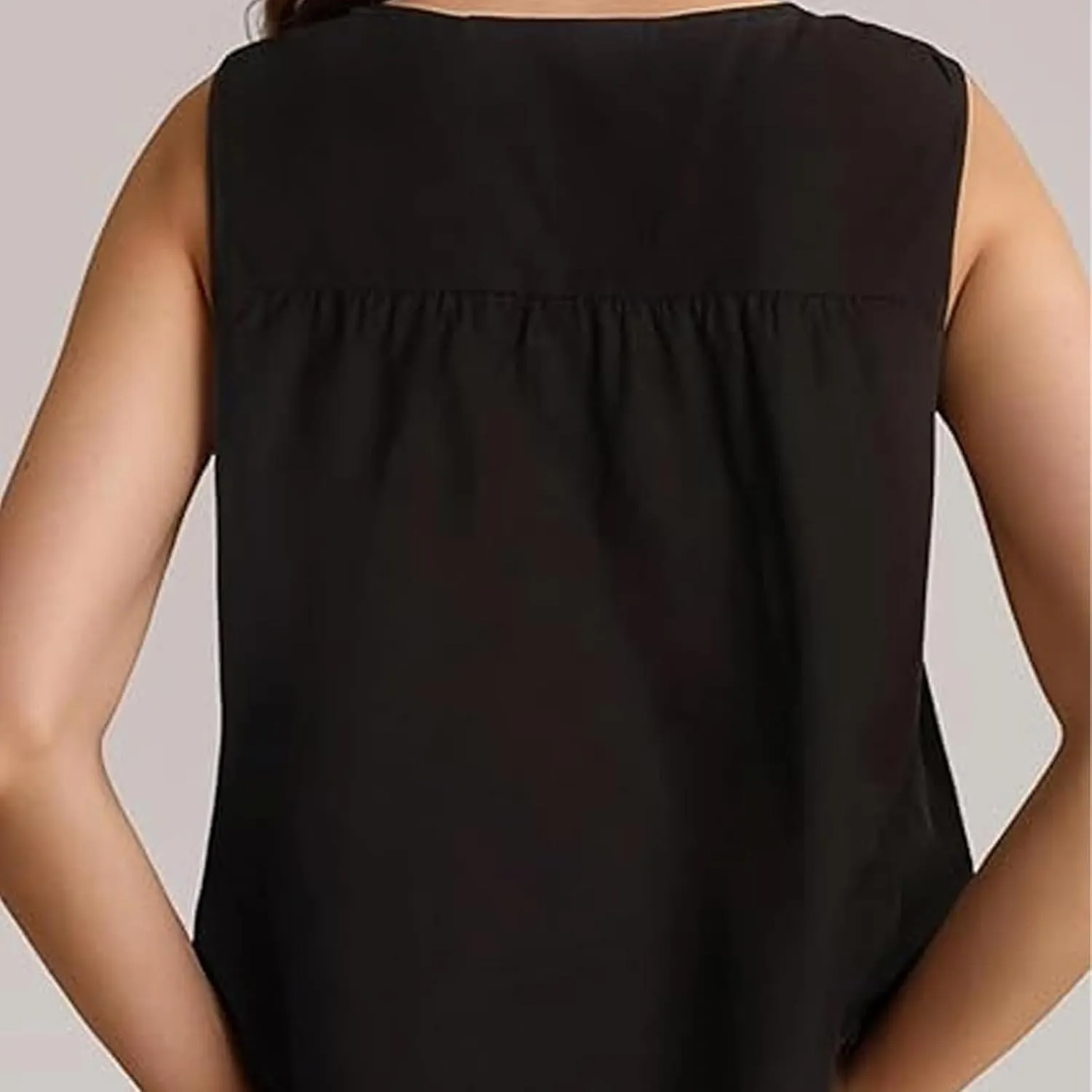 WOWULOVELY Womens Peplum Babydoll Tops Shirred Swing Tank Summer Sleeveless Pleated Flowy Vest Loose Ruffled Casual T-Shirts
